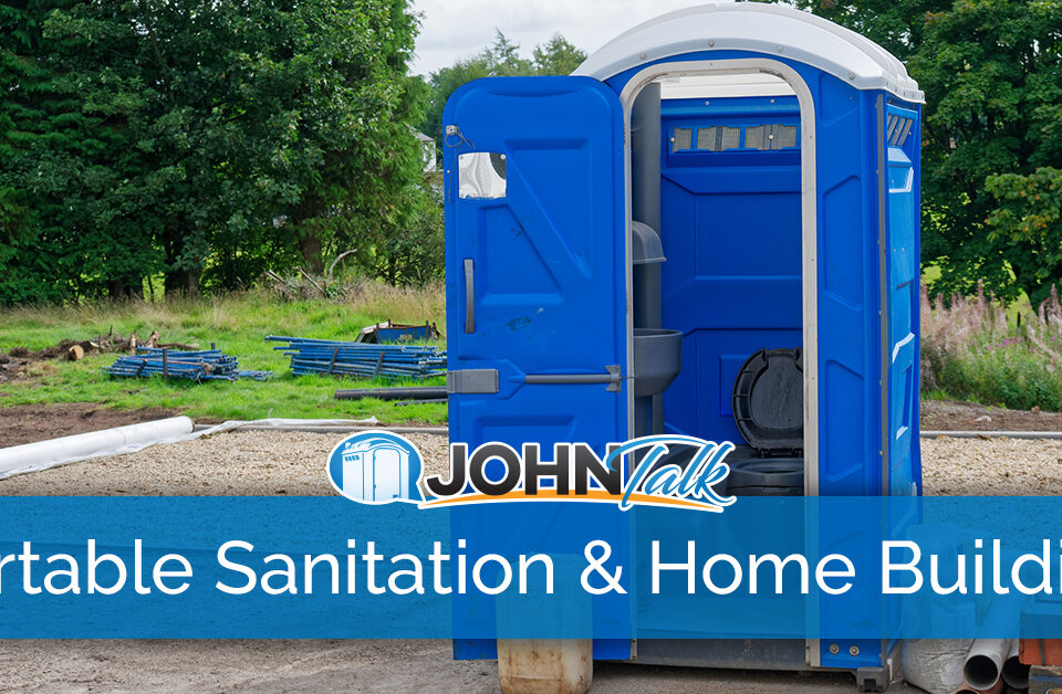 A portable toilet at a home building site
