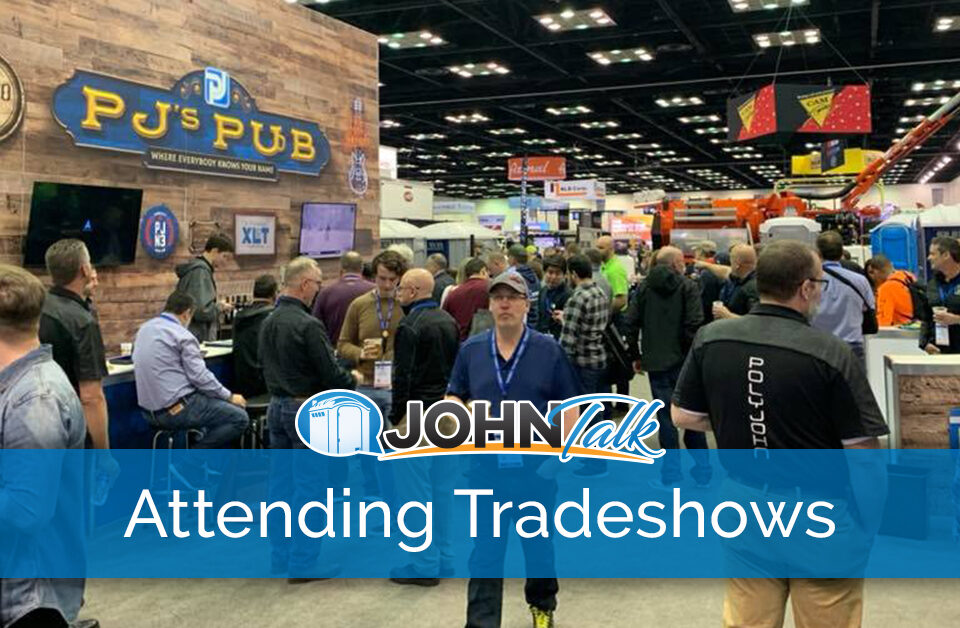 A group of people at the portable sanitation industry's WWETT Show