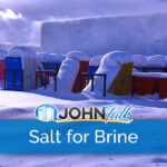 Portable toilets and portable toilet pieces covered in snow