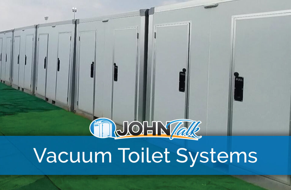 A row of white units containing vacuum toilet systems